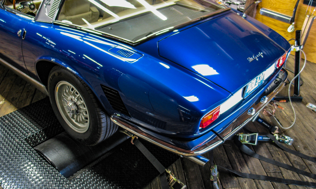 Red Classic car on dyno