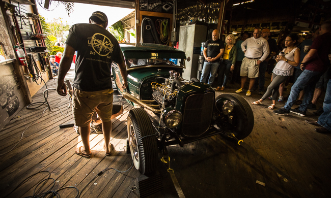 Vintage car on Dyno with a crowd on Dyno day