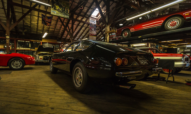 The Creative Workshop black car in shop